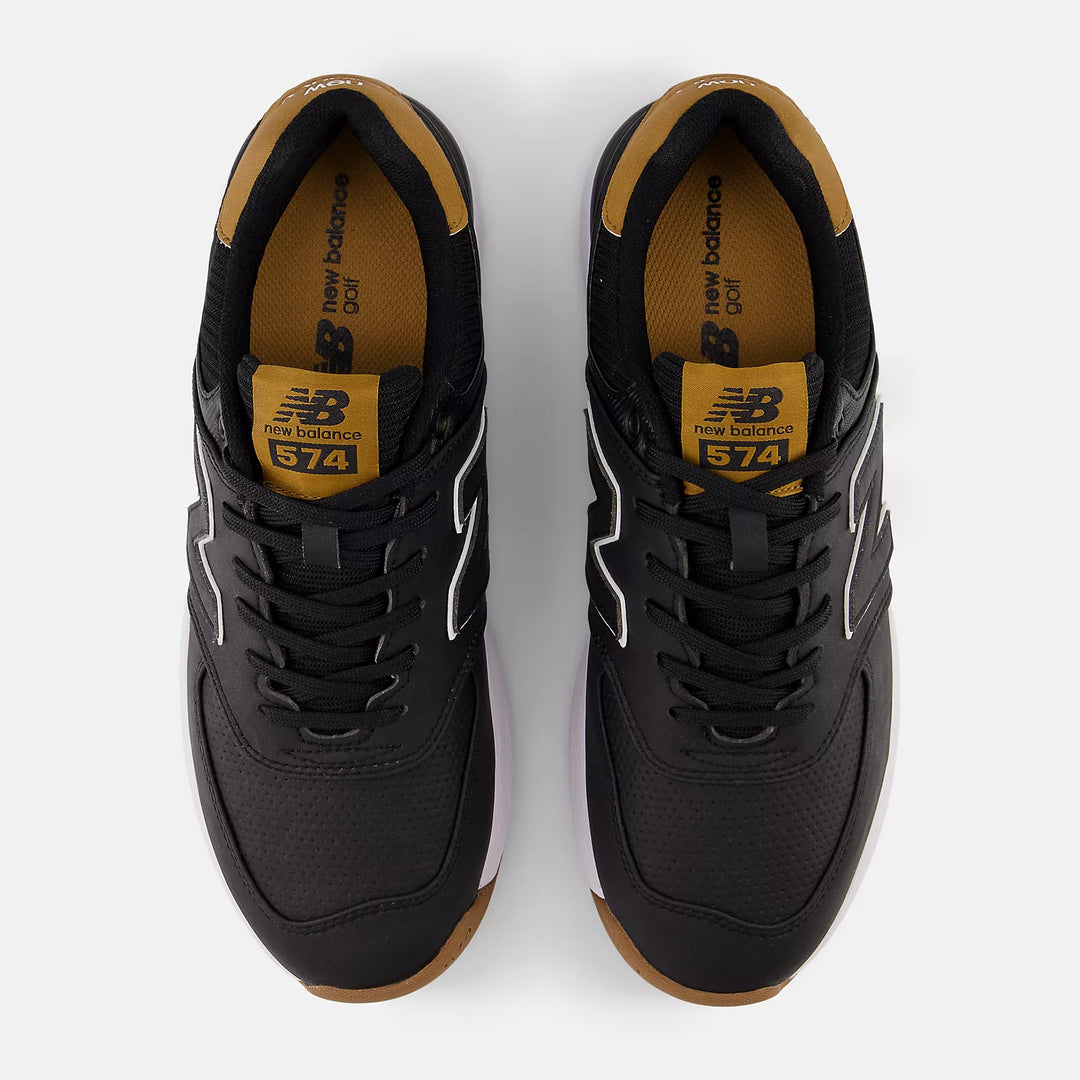 Overhead view of New Balance 574 golf shoes with lace-up design and 574 branding. Premium golf footwear at Noosa Golf Co., Sunshine Coast.