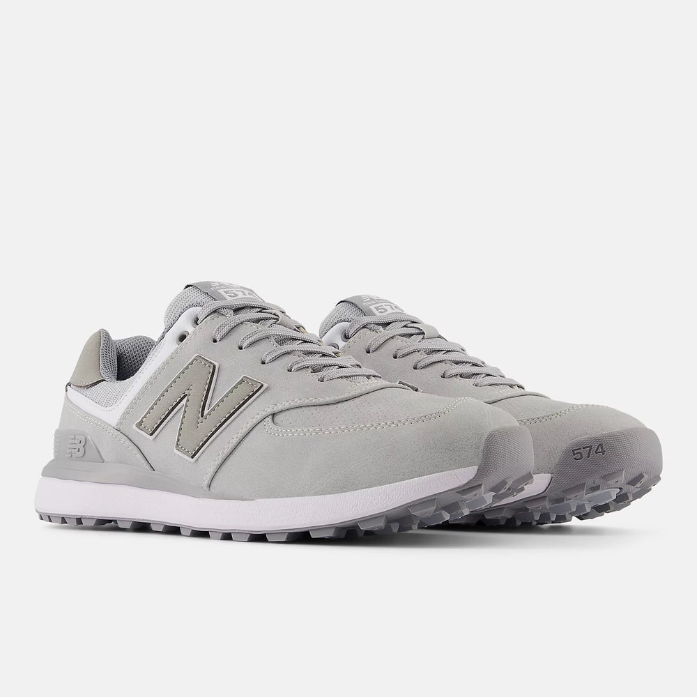 Angled side view of the New Balance 574 Greens in light grey. Performance golf footwear at Sunshine Coast’s Noosa Golf Co.