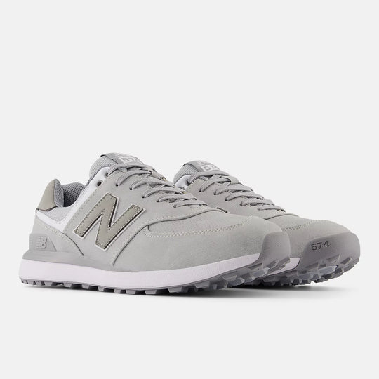 Angled side view of the New Balance 574 Greens in light grey. Performance golf footwear at Sunshine Coast’s Noosa Golf Co.