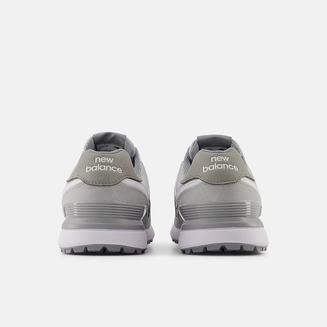 Rear heel view of New Balance 574 golf shoes in light grey with New Balance logo. Premium golf shoes at Noosa Golf Co., top Sunshine Coast golf store.