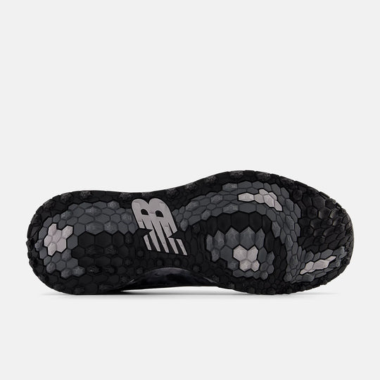 Hex-patterned outsole of the New Balance Fresh Foam Contend v2 golf shoe in black and grey camo, showing multidirectional grip design. Available at golf shop Noosa and Sunshine Coast.